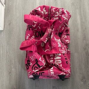 Pink Rolling Duffel Bag with Black and White Print